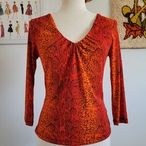 B. True | 90s Orange + Red Snakeskin Print V-Neck